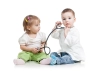 عکس استوک با کیفیت کودک و بازی باگوشی پزشکی