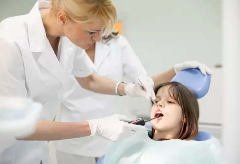 دانلود تصویر کیفیت ترمیم دندان بیمار کودک