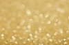 تصویر استوک بوکه های درخشان طلایی
