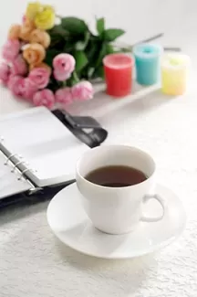 عکس باکیفیت فنجان قهوه و دفترچه