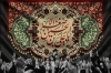 بنر پشت منبر شیرخوارگان حسینی شامل خوشنویسی یا علی بن الحسین الاصغر